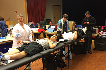 Students donate blood.